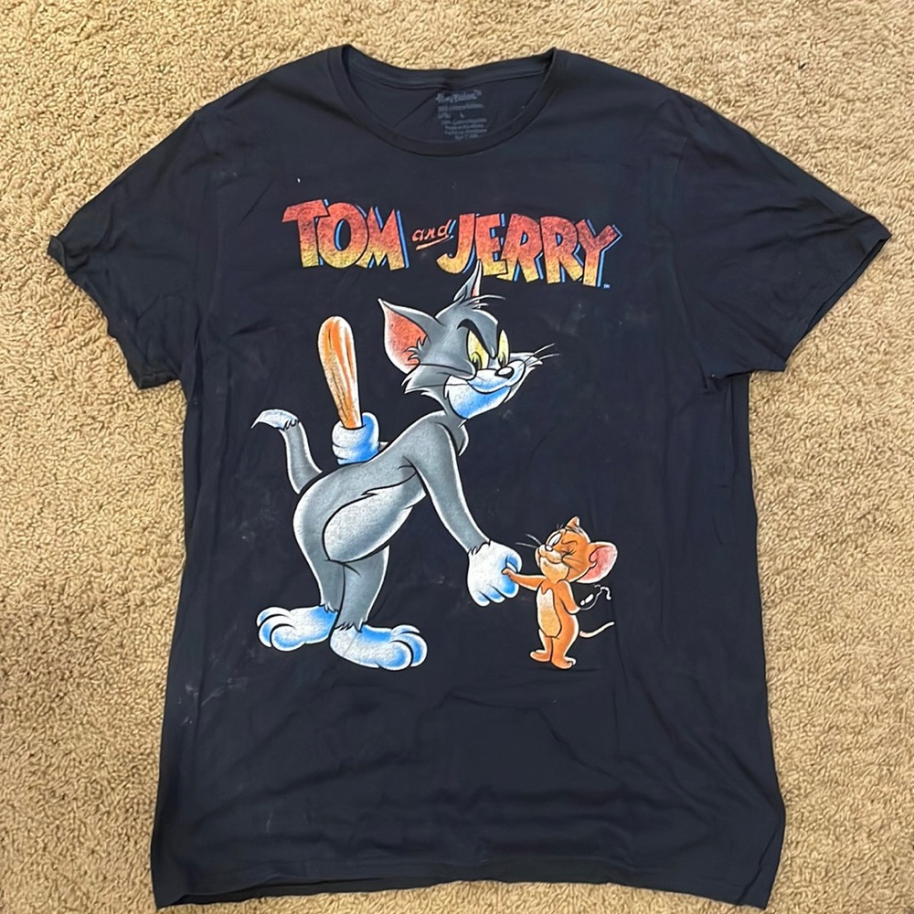 Black shirt. Tom and Jerry